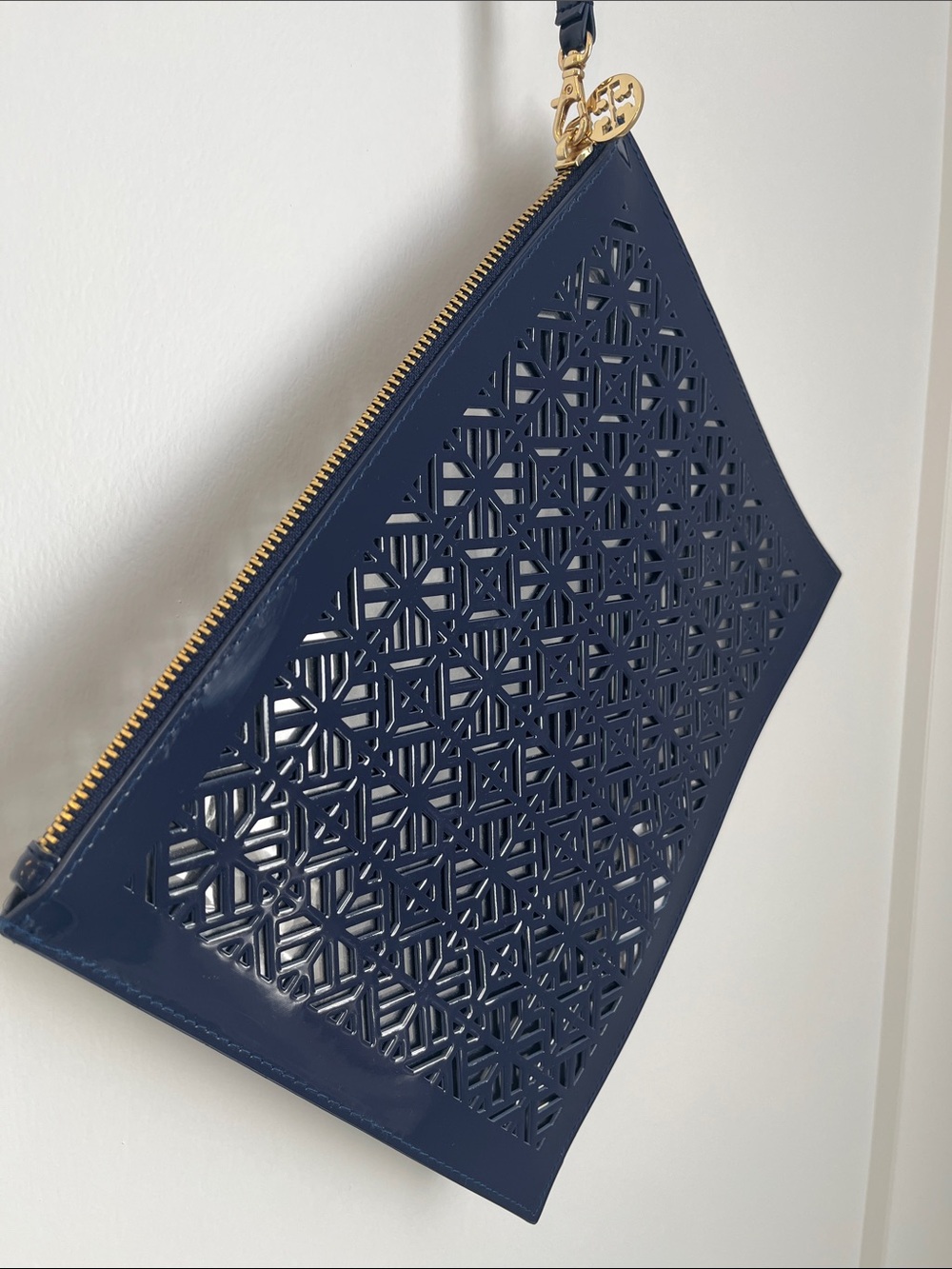 Tory Burch Navy Laser-Cut Patent Wristlet with Gold Hardware